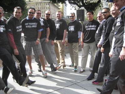 Guys Roll Up Pant Legs and Hobble a Mile in Her Shoes