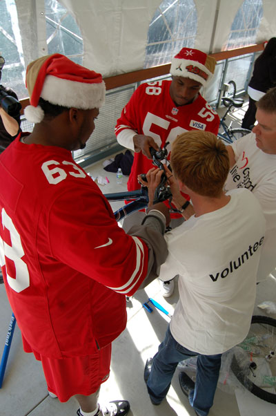 49ers Stars Bring Joy to Children; Build Bikes for Children
