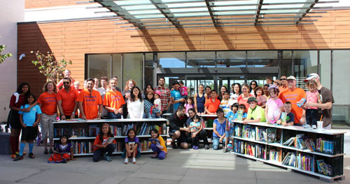 Community Gathers for Milk Crate Library Opening