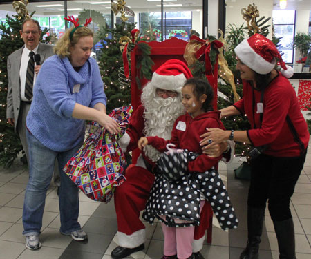 Rotary's Christmas for Kids Puts Big Smiles on Young Faces Rotary's Christmas for Kids Puts Big Smiles on Young Faces