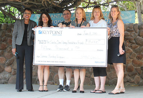 Check Presentation and Indian Dancing Mark Library's Family Fun Night Check Presentation and Indian Dancing Mark Library's Family Fun Night