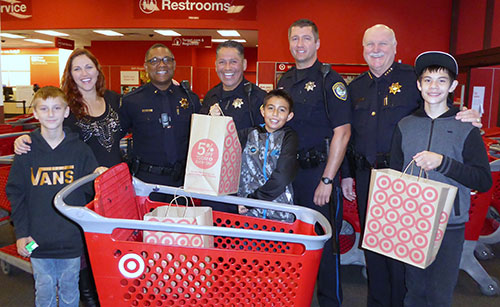 Cops Escort Kids on P.A.L. Holiday Shopping Spree Cops Escort Kids on P.A.L. Holiday Shopping Spree