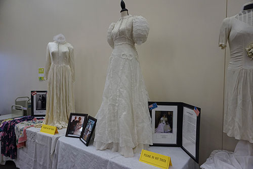 Headline: WWII wedding dresses displayed at library Headline: WWII wedding dresses displayed at library